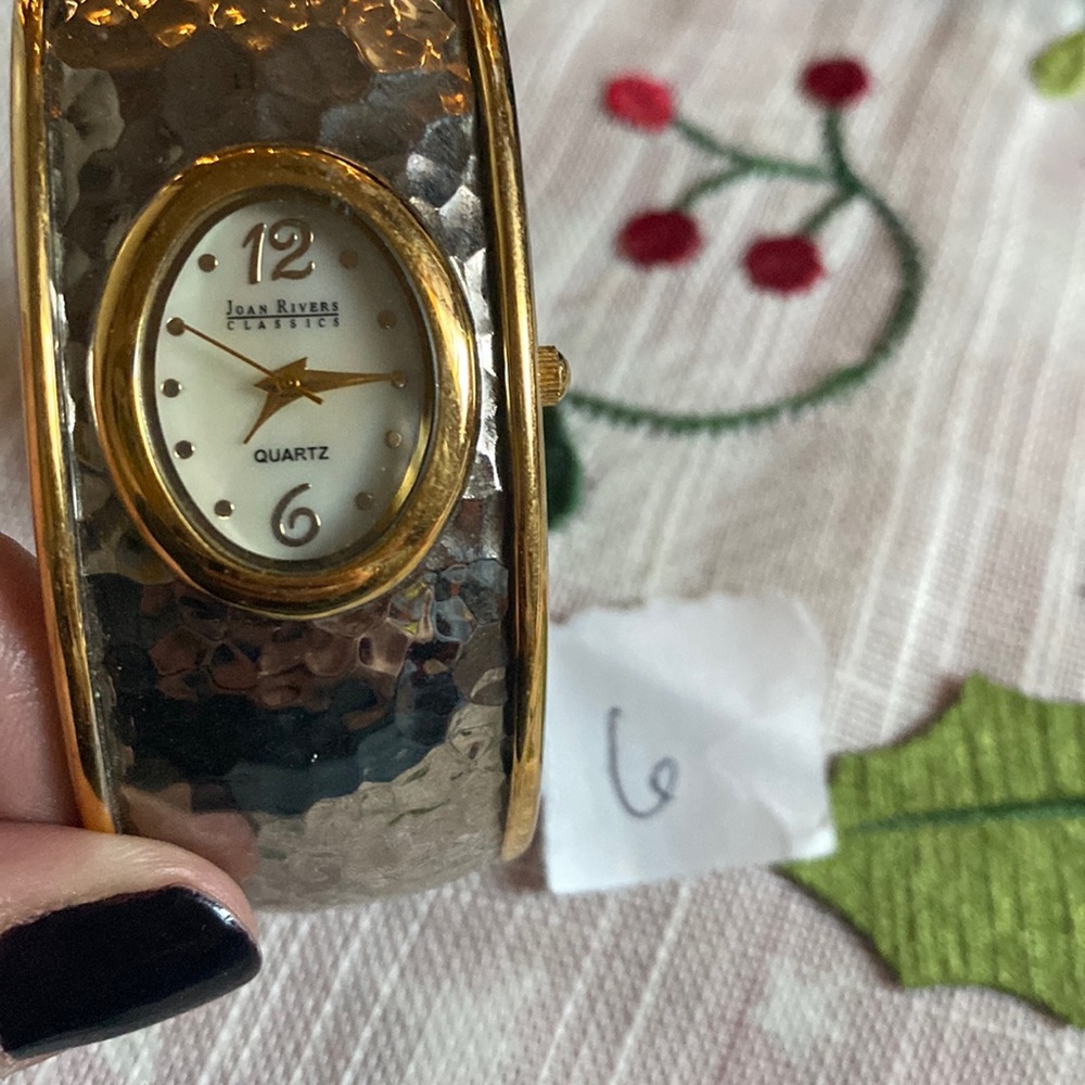 Retired Joan Rivers bangle cuff wristwatch